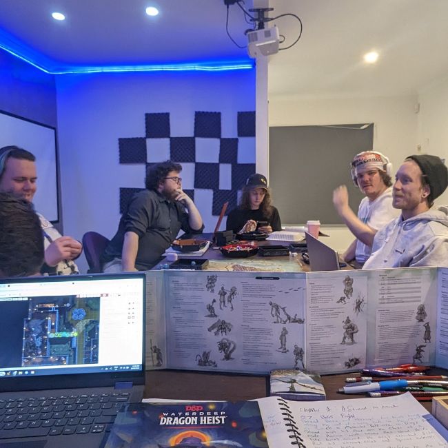 Autism Gaming Group Canberra Participants Sitting Around A Table Playing DnD